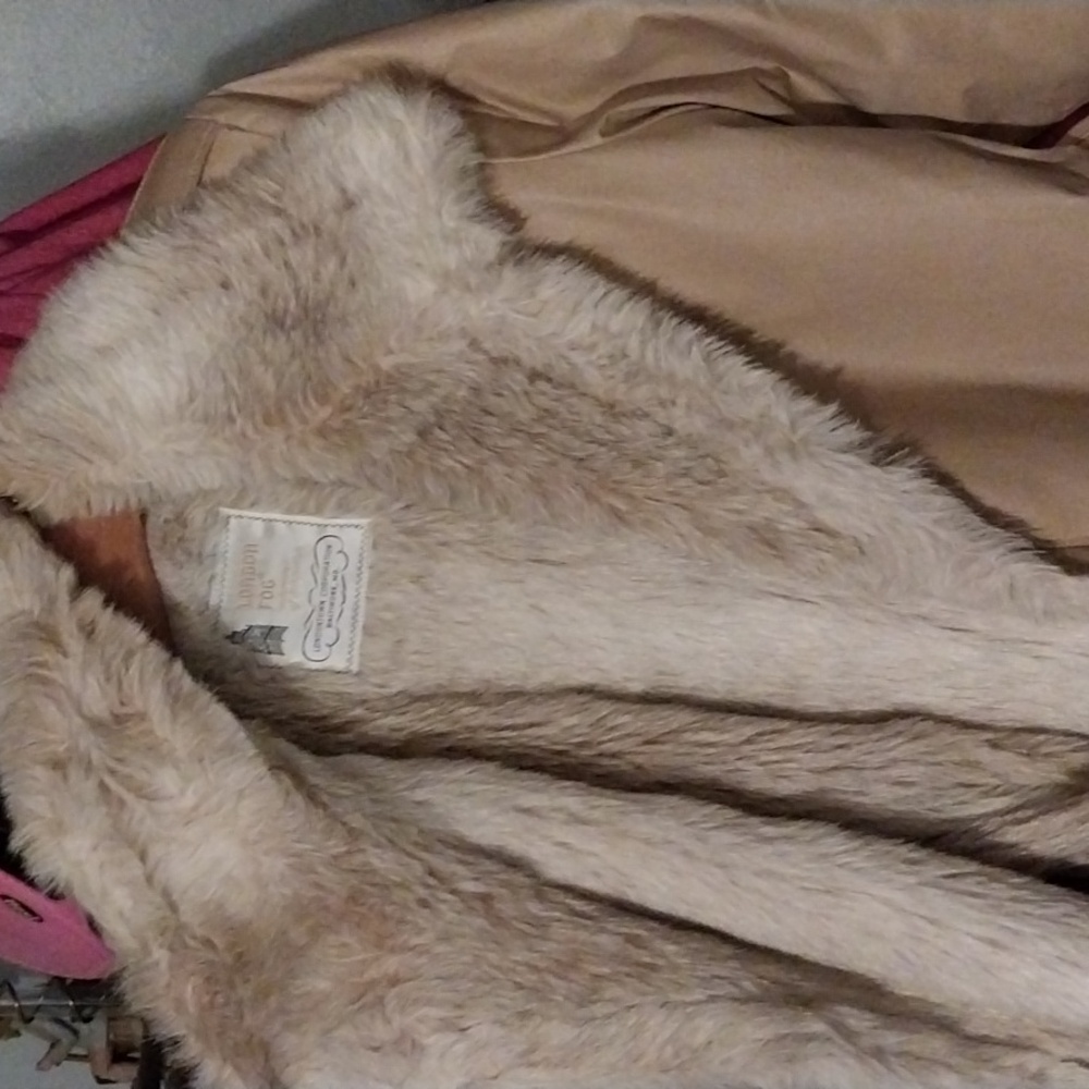 London fog wemens coats Carmel color faxx fur all in it size 10 brand new.